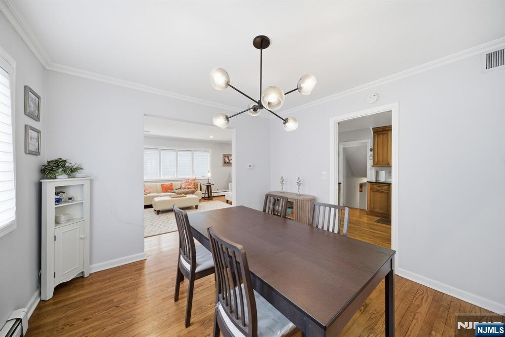 126 Sussex Road Tenafly, NJ 07670 - Photo 23 of 50 a view of a dining room with furniture and wooden floor