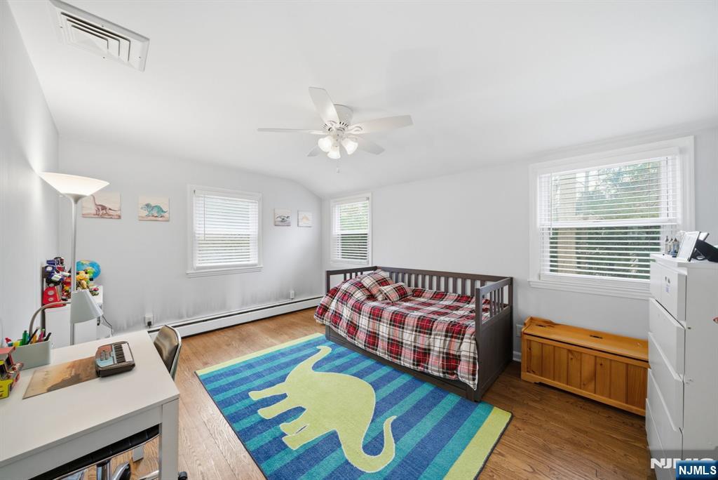 126 Sussex Road Tenafly, NJ 07670 - Photo 25 of 50 a bedroom with furniture and a window