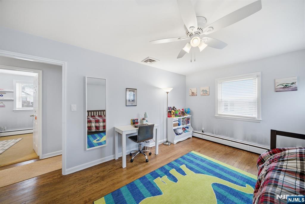 126 Sussex Road Tenafly, NJ 07670 - Photo 26 of 50 a living room with furniture and wooden floor