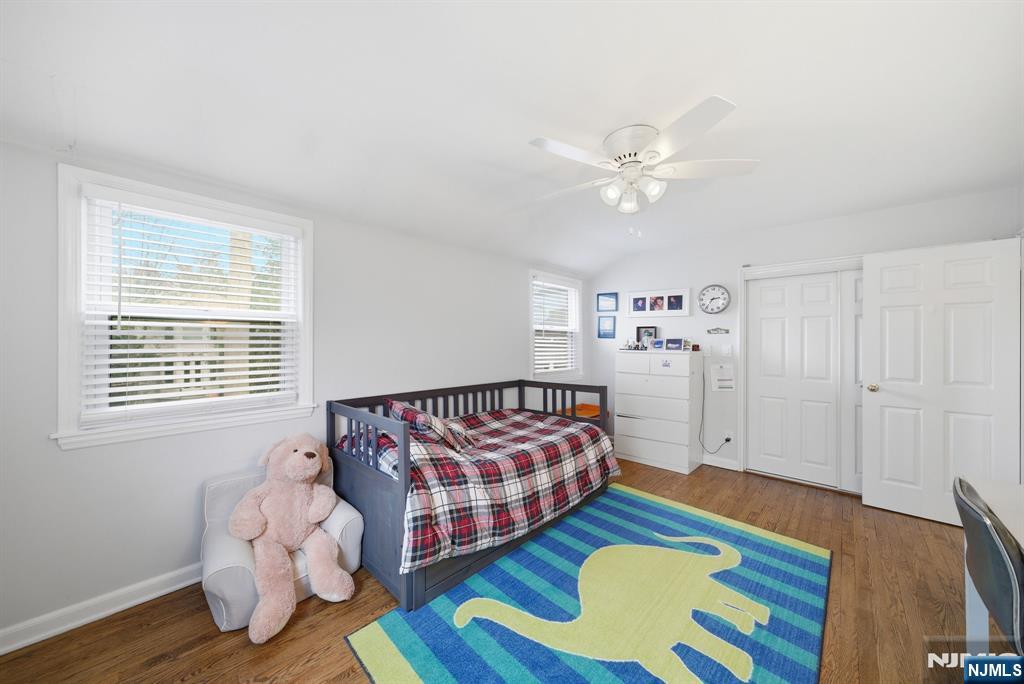 126 Sussex Road Tenafly, NJ 07670 - Photo 27 of 50 a bedroom with furniture and a window