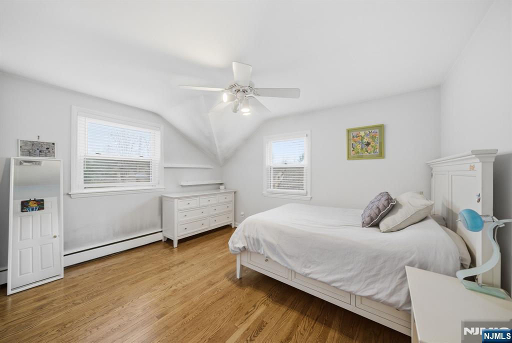 126 Sussex Road Tenafly, NJ 07670 - Photo 28 of 50 a bedroom with a bed and a window