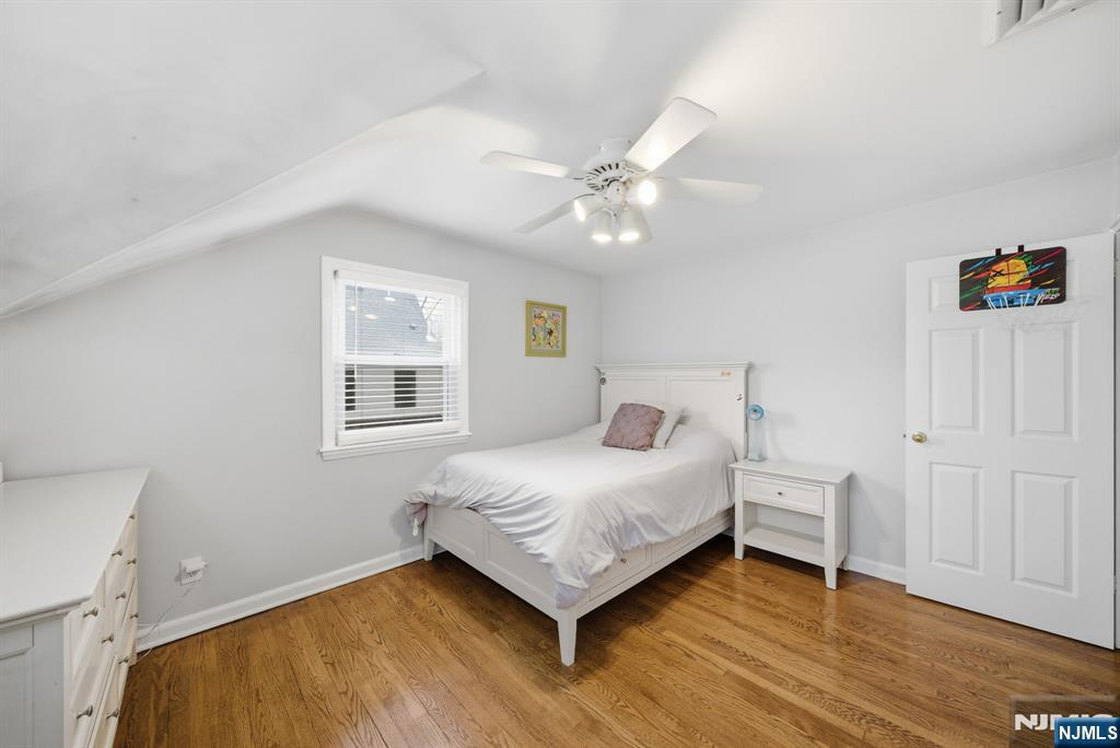 126 Sussex Road Tenafly, NJ 07670 - Photo 29 of 50 a bedroom with a bed and a window