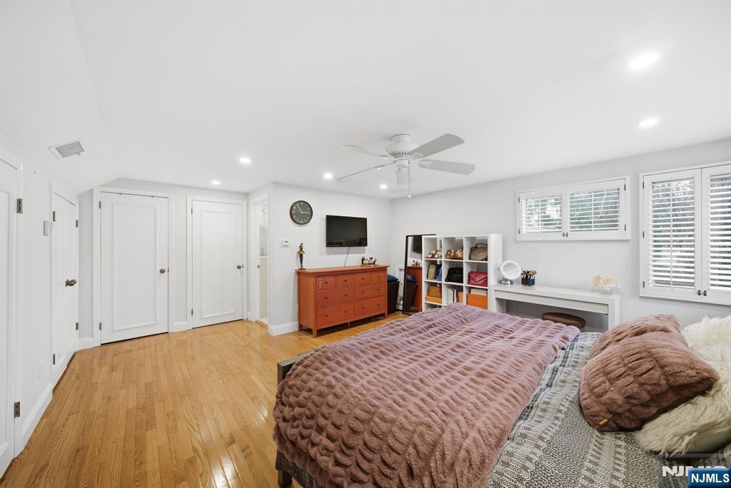 126 Sussex Road Tenafly, NJ 07670 - Photo 36 of 50 a bedroom with a large bed and a large window