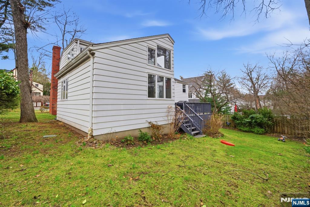 126 Sussex Road Tenafly, NJ 07670 - Photo 42 of 50 a view of a house with a yard