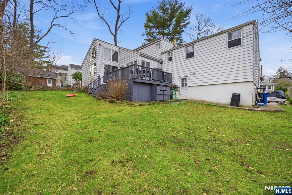 126 Sussex Road Tenafly, NJ 07670 - Photo 44 of 50 a view of a house with a yard and sitting area
