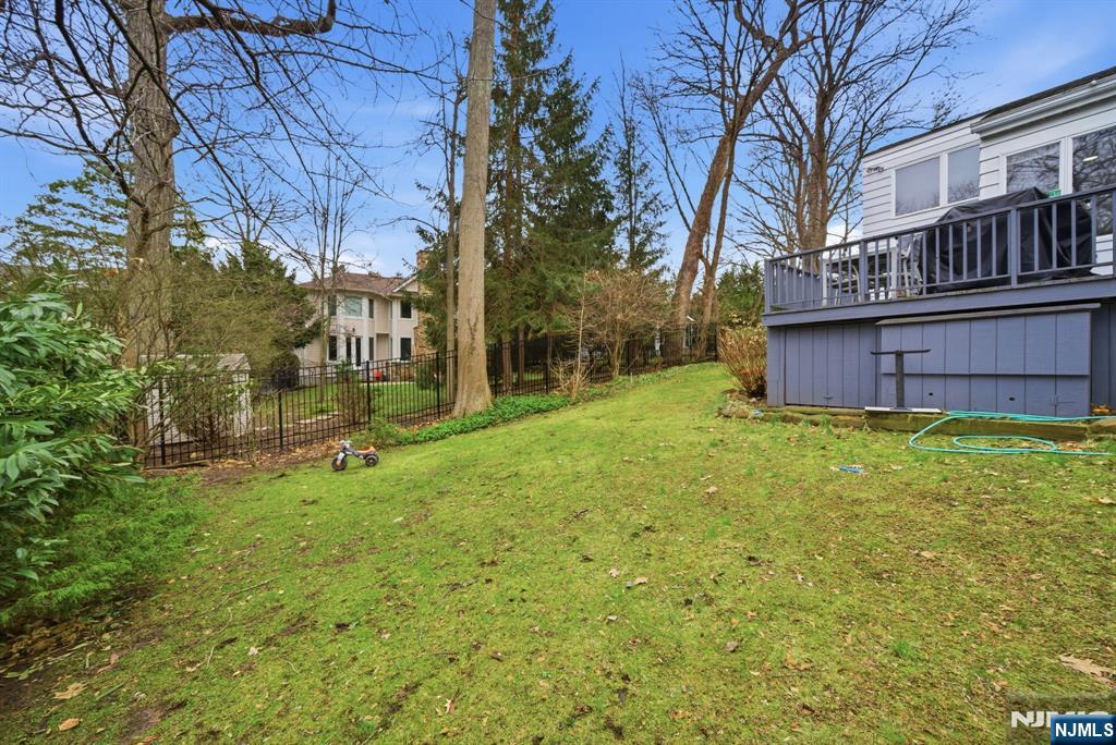 126 Sussex Road Tenafly, NJ 07670 - Photo 45 of 50 a view of a backyard with a tree