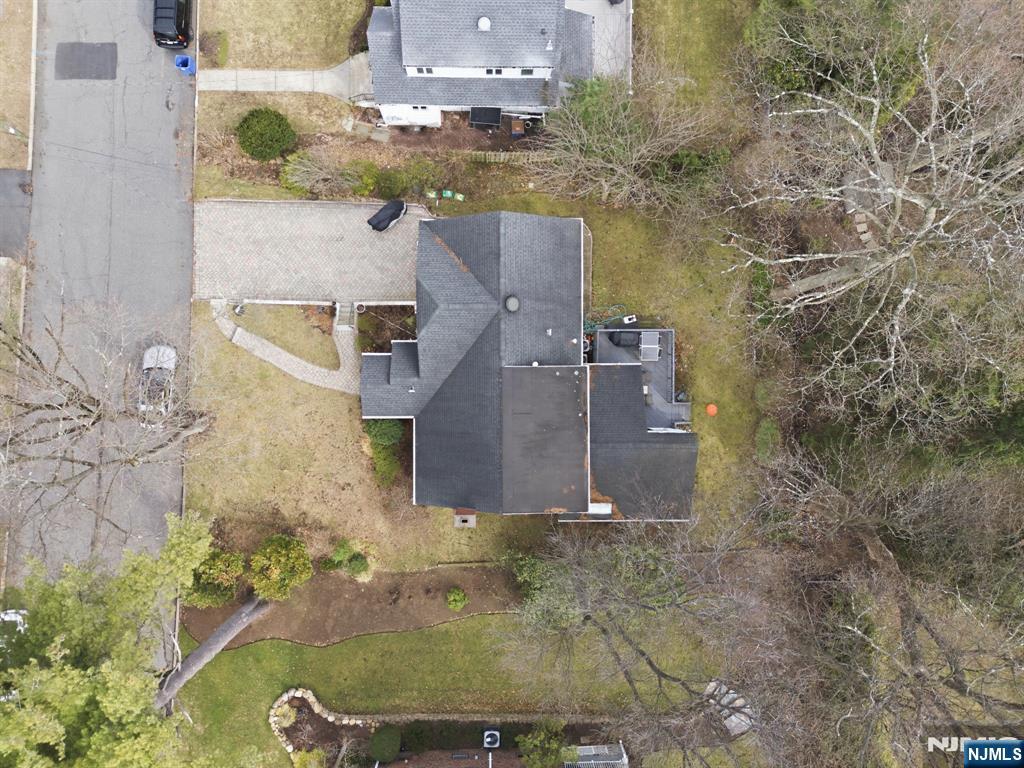 126 Sussex Road Tenafly, NJ 07670 - Photo 48 of 50 an aerial view of a house with a yard