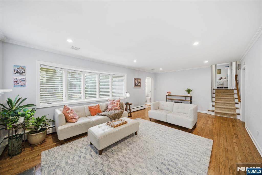126 Sussex Road Tenafly, NJ 07670 - Photo 8 of 50 a living room with furniture and wooden floor