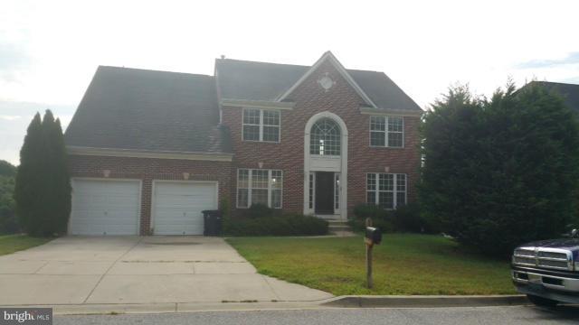 3004 Kidder Road Clinton, MD 20735 - Photo 1 of 23 a front view of a house with garden