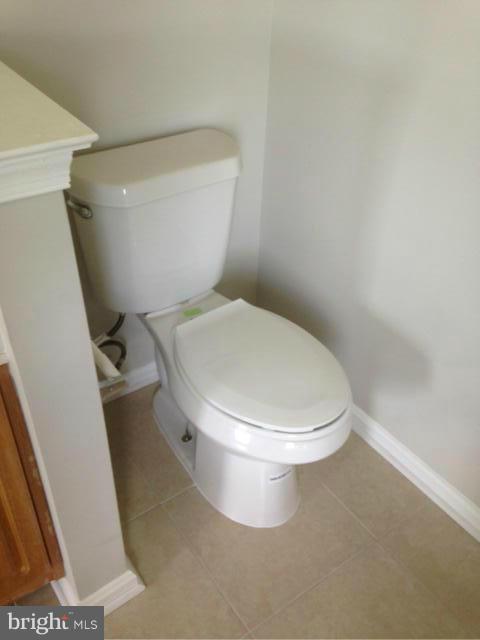3004 Kidder Road Clinton, MD 20735 - Photo 15 of 23 a white toilet sitting next to a sink
