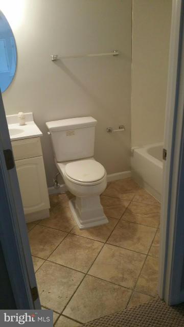 3004 Kidder Road Clinton, MD 20735 - Photo 22 of 23 a bathroom with a toilet and a shower