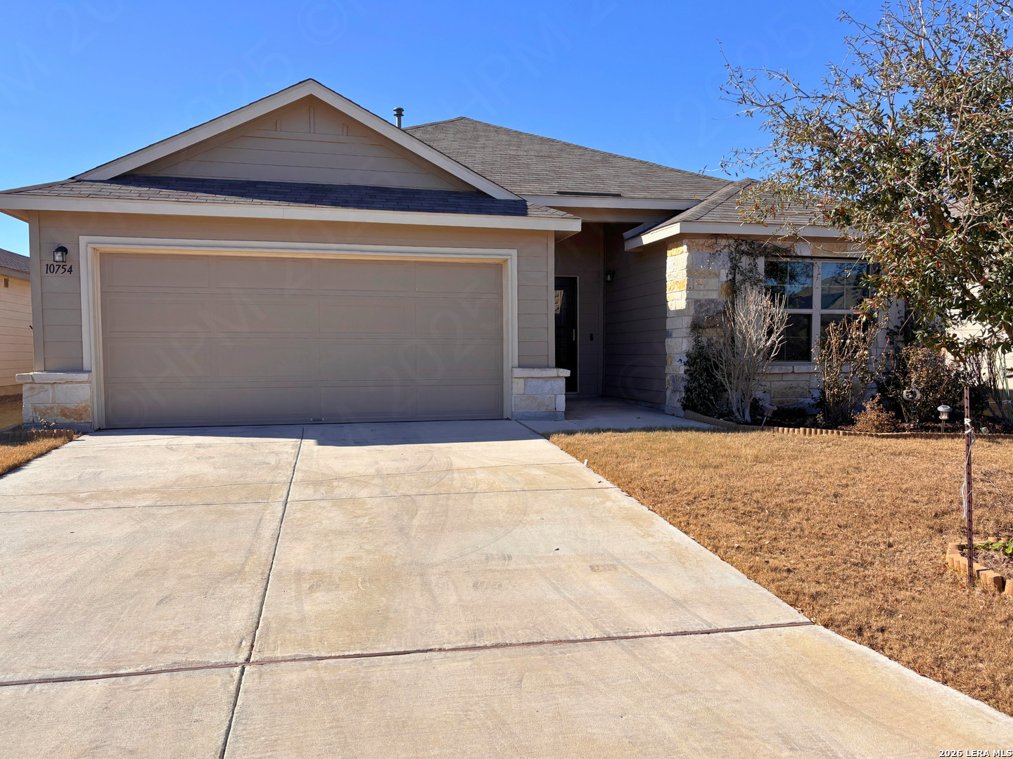 10754 Francisco Way Converse, TX 78109 - Photo 1 of 18 a front view of a house with a yard