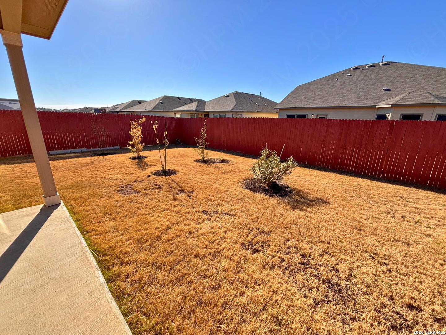 10754 Francisco Way Converse, TX 78109 - Photo 17 of 18 a backyard of a house with table and chairs