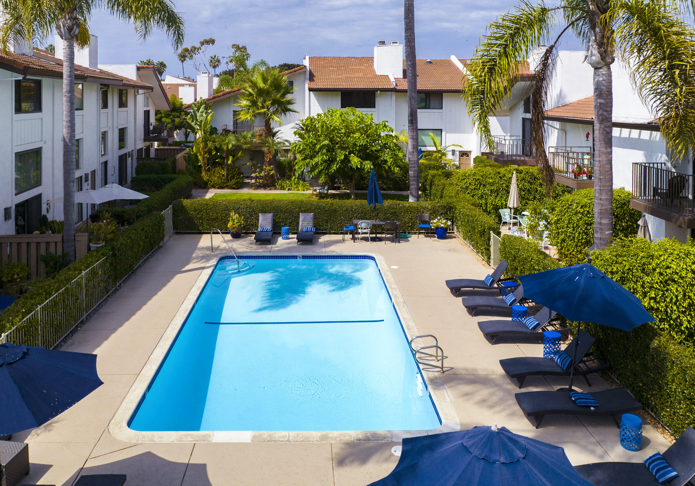 653 Verde Mar Drive, Unit E Santa Barbara, CA 93103 - Photo 21 of 23 a view of a swimming pool with lounge chair