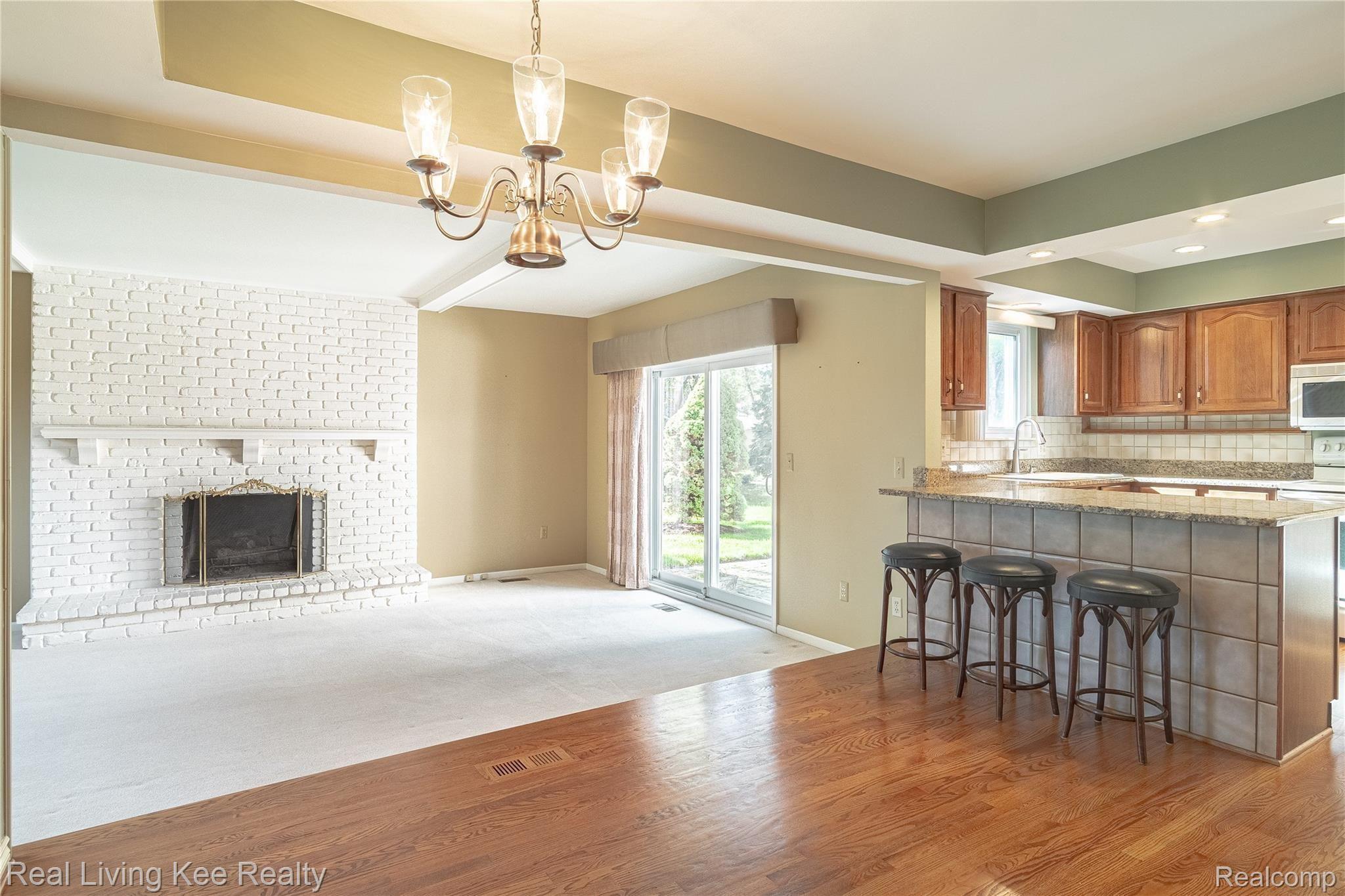 988 Briston Drive Rochester, MI 48307 - Photo 42 of 79 Open Family Room & Kitchen Area