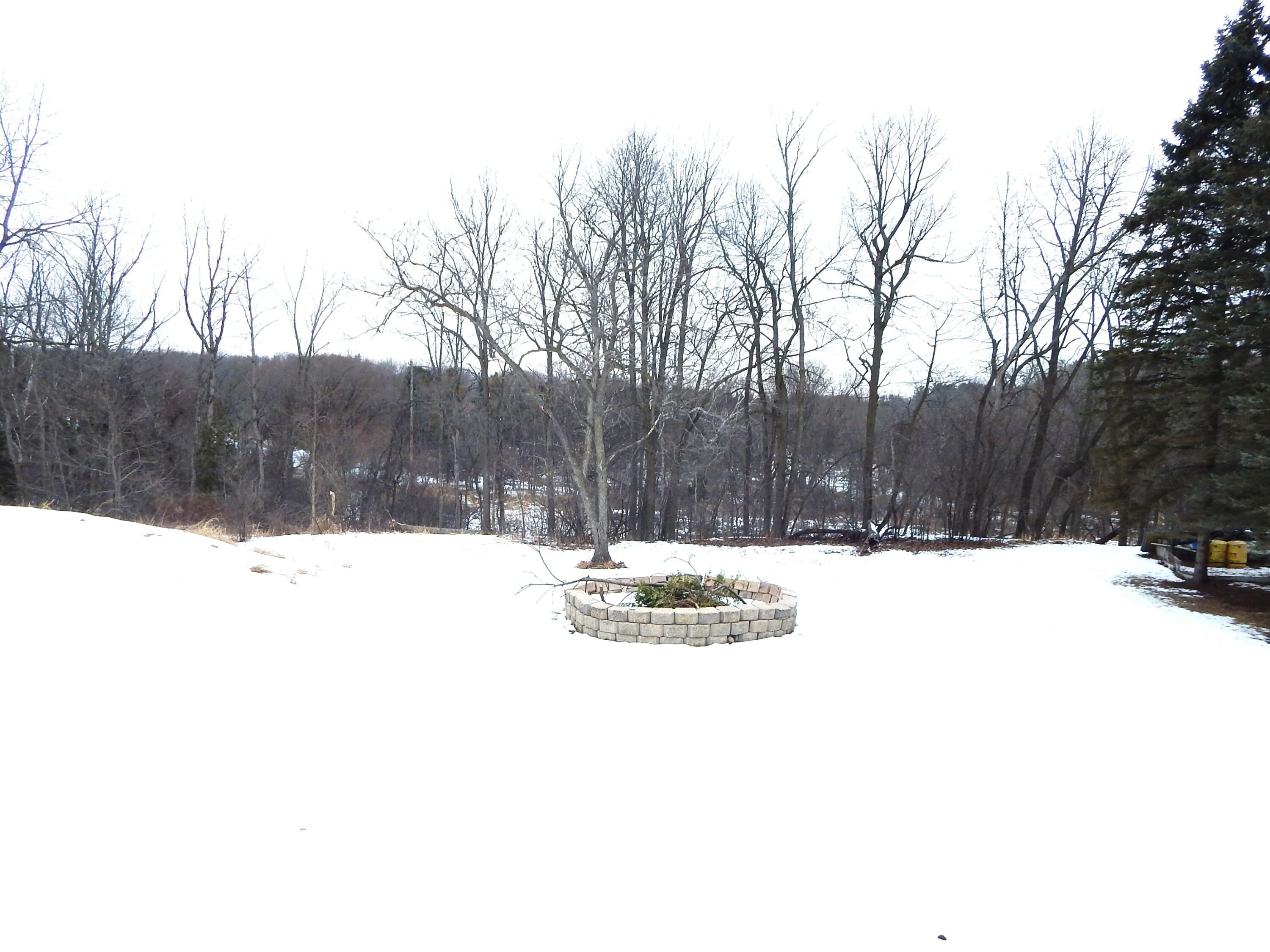 4040 Spring Court Sheboygan, WI 53081 - Photo 4 of 16 Back Yard overlooking Pigeon River Valley