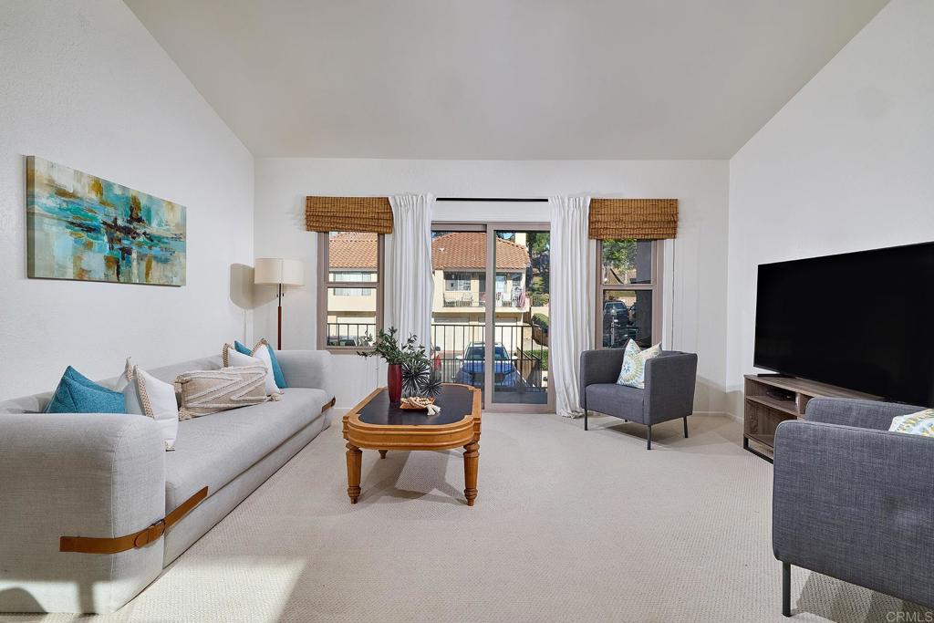 1055 Ficus Lane San Marcos, CA 92069 - Photo 3 of 16 a living room with furniture and a flat screen tv