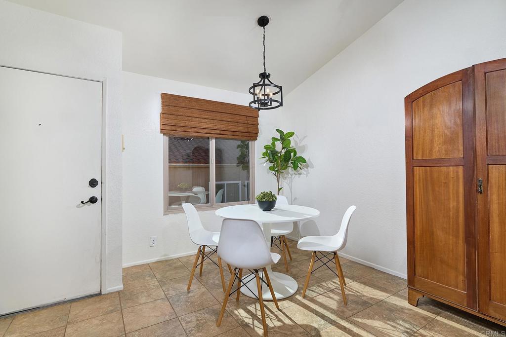 1055 Ficus Lane San Marcos, CA 92069 - Photo 5 of 16 a view of a dining room with furniture window and wooden floor