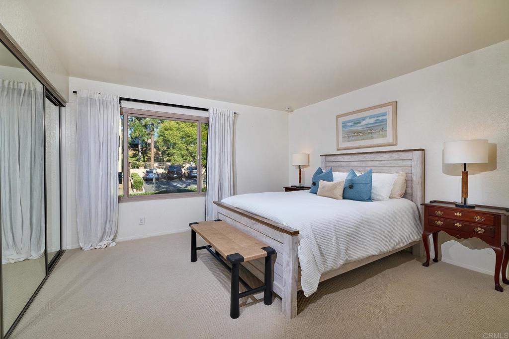 1055 Ficus Lane San Marcos, CA 92069 - Photo 8 of 16 a bedroom with a bed and a window