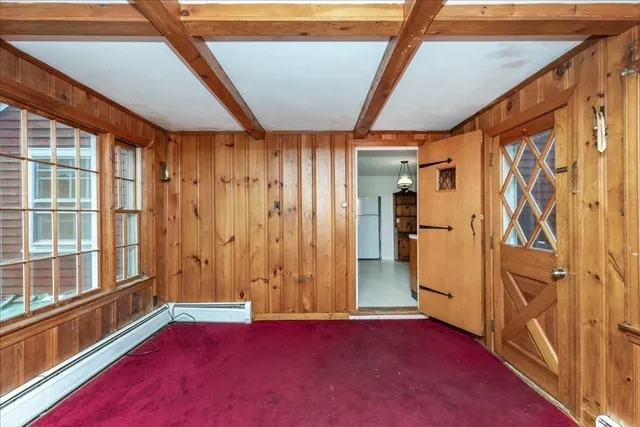 a view of empty room with windows
