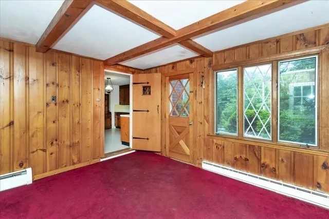 en empty room with windows