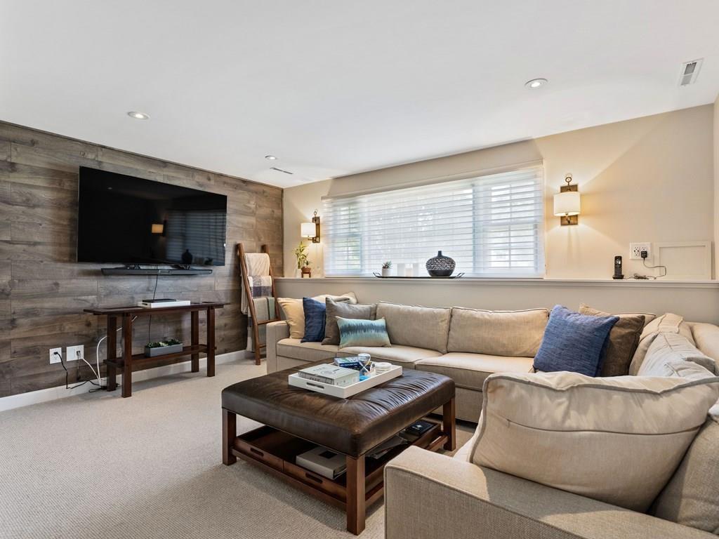 78 Standish Road Needham, MA 02492 - Photo 6 of 16 a living room with furniture and a flat screen tv