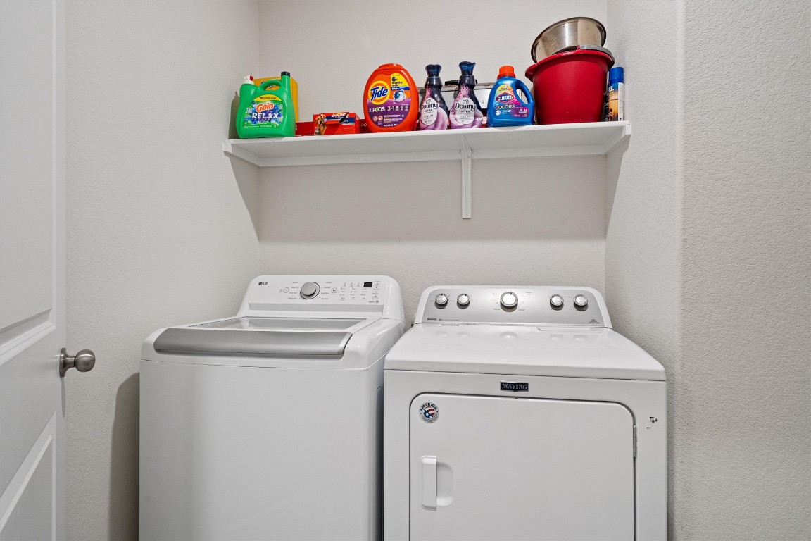 160 Gunther Way Taylor, TX 76574 - Photo 21 of 24 a utility room with dryer and washer