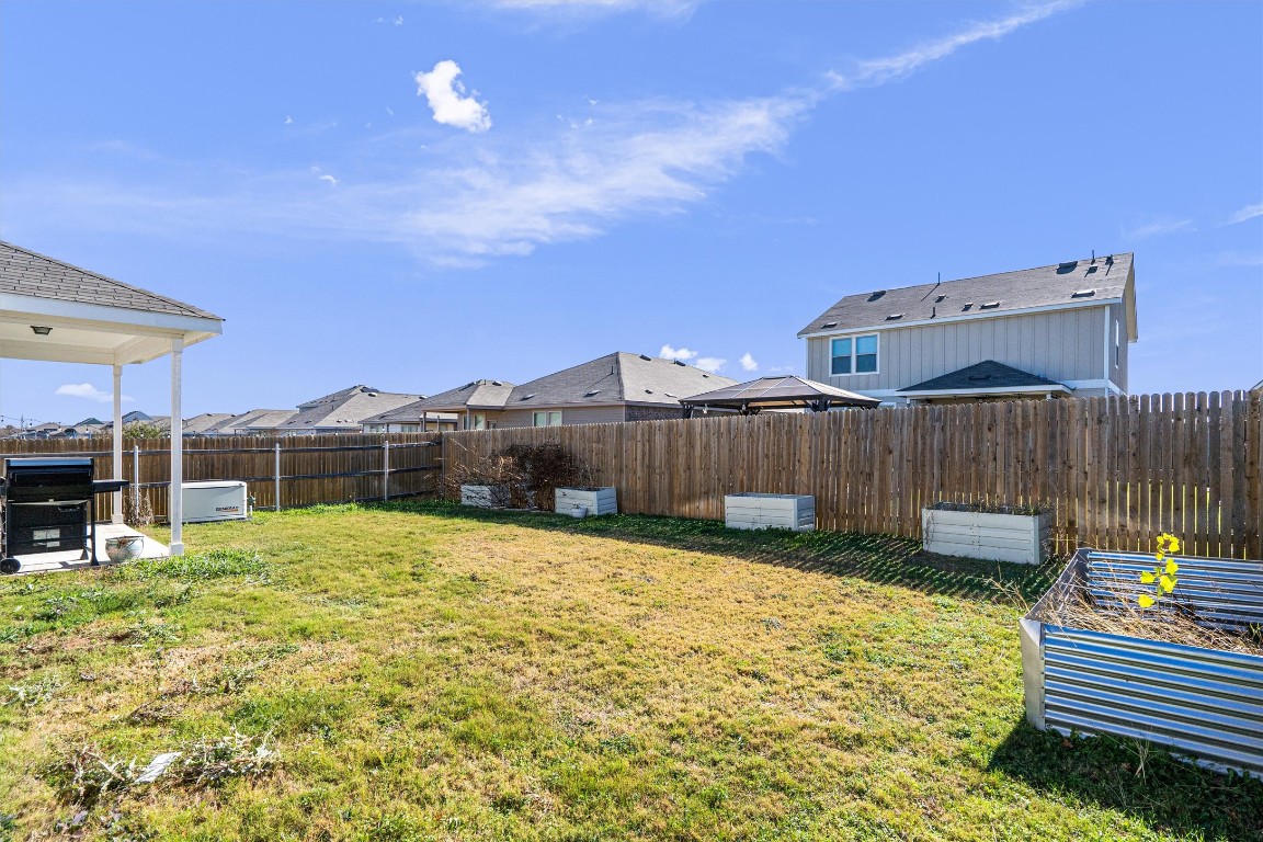 160 Gunther Way Taylor, TX 76574 - Photo 22 of 24 a view of a backyard