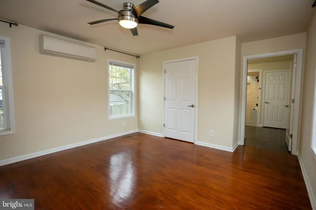a bathroom with a sink a toilet and a bathtub