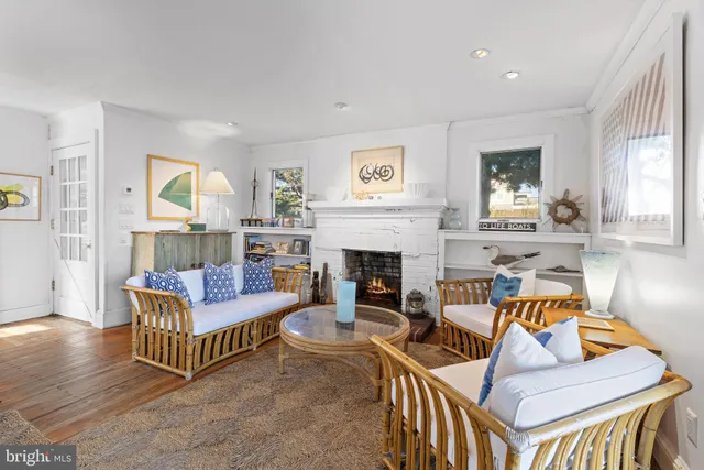 a dining room with furniture and windows