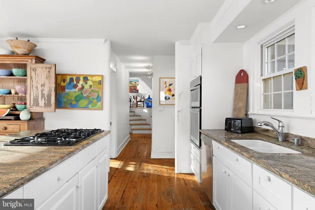 a bathroom with a sink and a bathtub