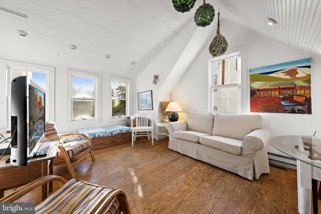 an aerial view of a house with a swimming pool