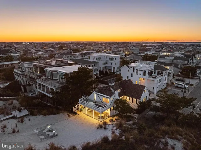 a view of a balcony with chairs and a table