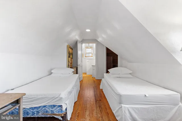 a view of water heater and covered with wooden floor