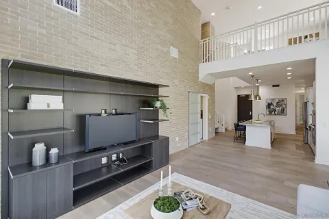 a front view of a house with outdoor seating