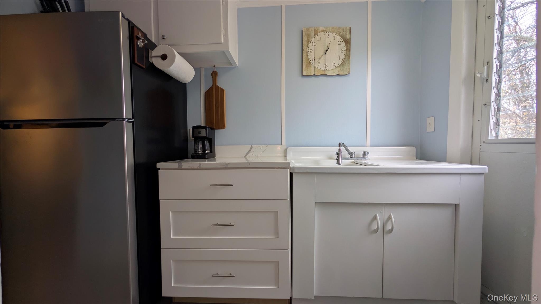 191 Sylvan Lake Road, Unit 28A Hopewell Junction, NY 12533 - Photo 11 of 38 a bathroom with a sink and a mirror