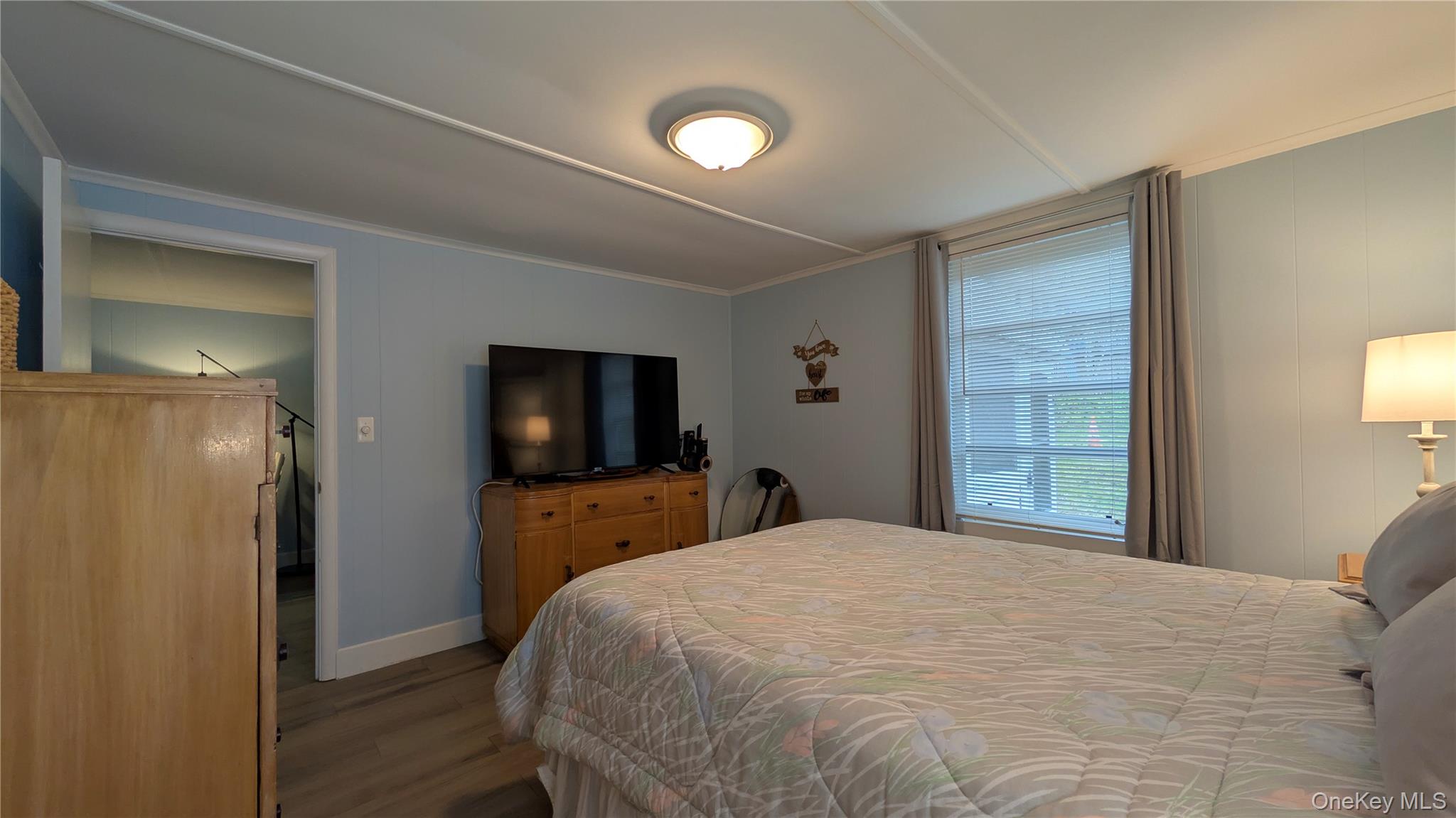 191 Sylvan Lake Road, Unit 28A Hopewell Junction, NY 12533 - Photo 12 of 38 a bedroom with a bed and a flat screen tv
