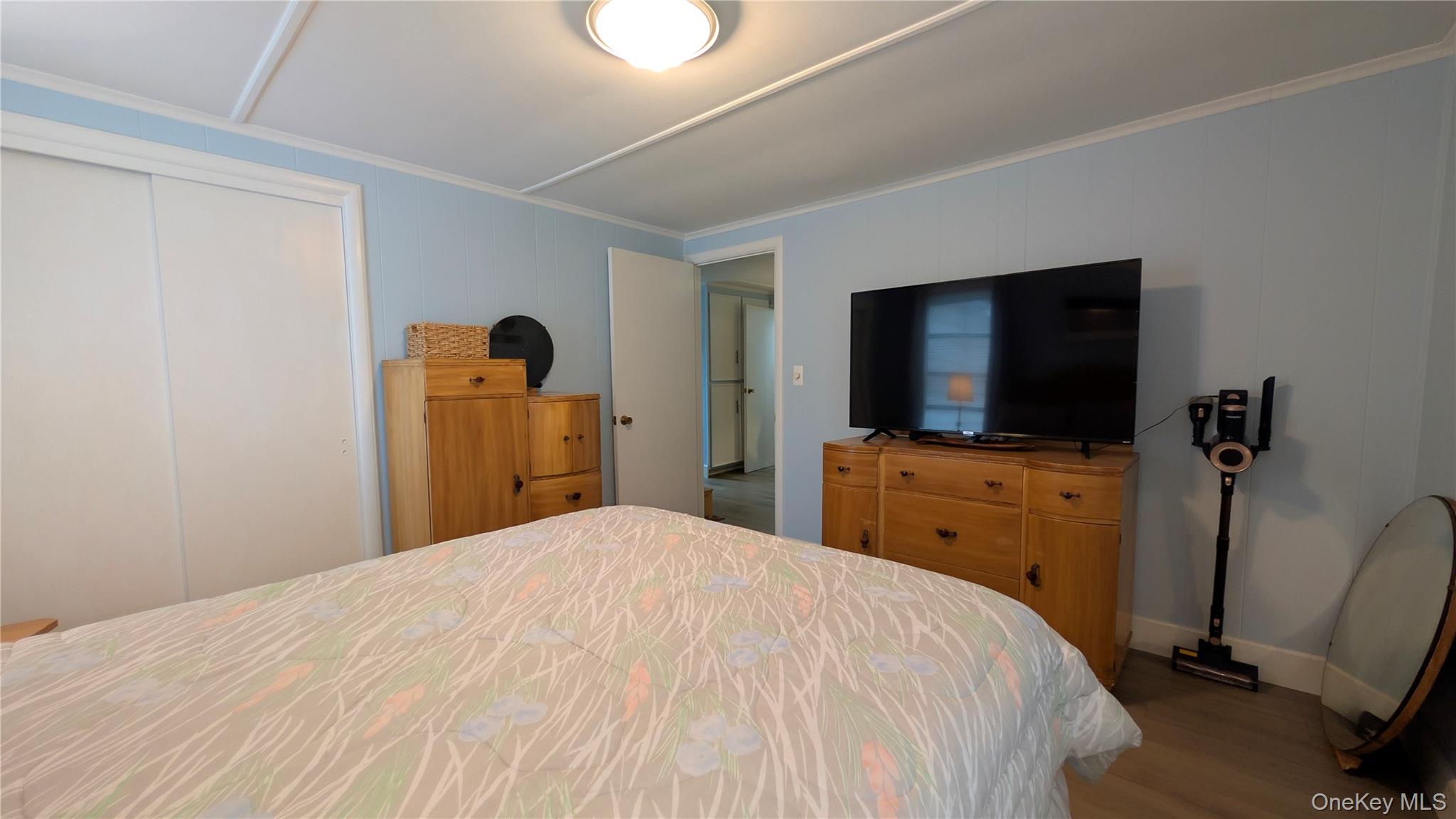 191 Sylvan Lake Road, Unit 28A Hopewell Junction, NY 12533 - Photo 15 of 38 a bedroom with a bed and a flat screen tv