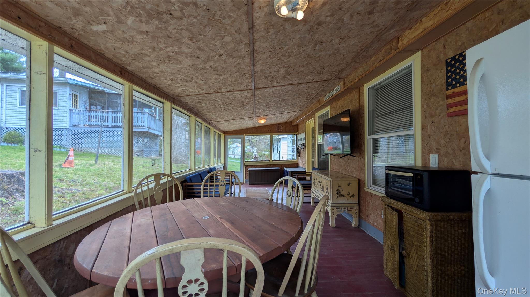 191 Sylvan Lake Road, Unit 28A Hopewell Junction, NY 12533 - Photo 2 of 38 a view of a dining room with furniture window and outside view