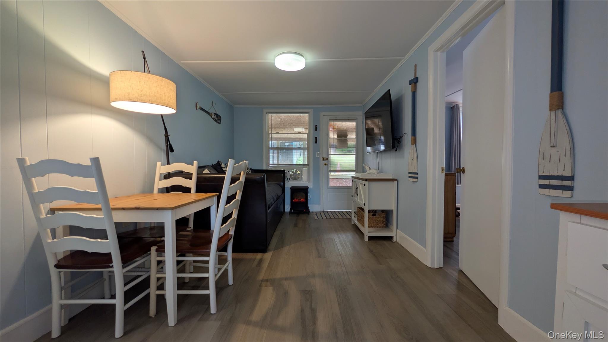 191 Sylvan Lake Road, Unit 28A Hopewell Junction, NY 12533 - Photo 6 of 38 a view of a dining room with furniture window and wooden floor