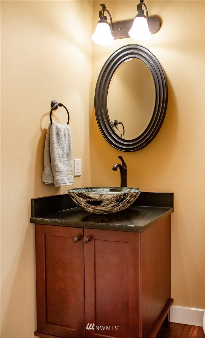 3191 McGee Road Custer, WA 98240 - Photo 14 of 27 a bathroom with a granite countertop sink and a mirror