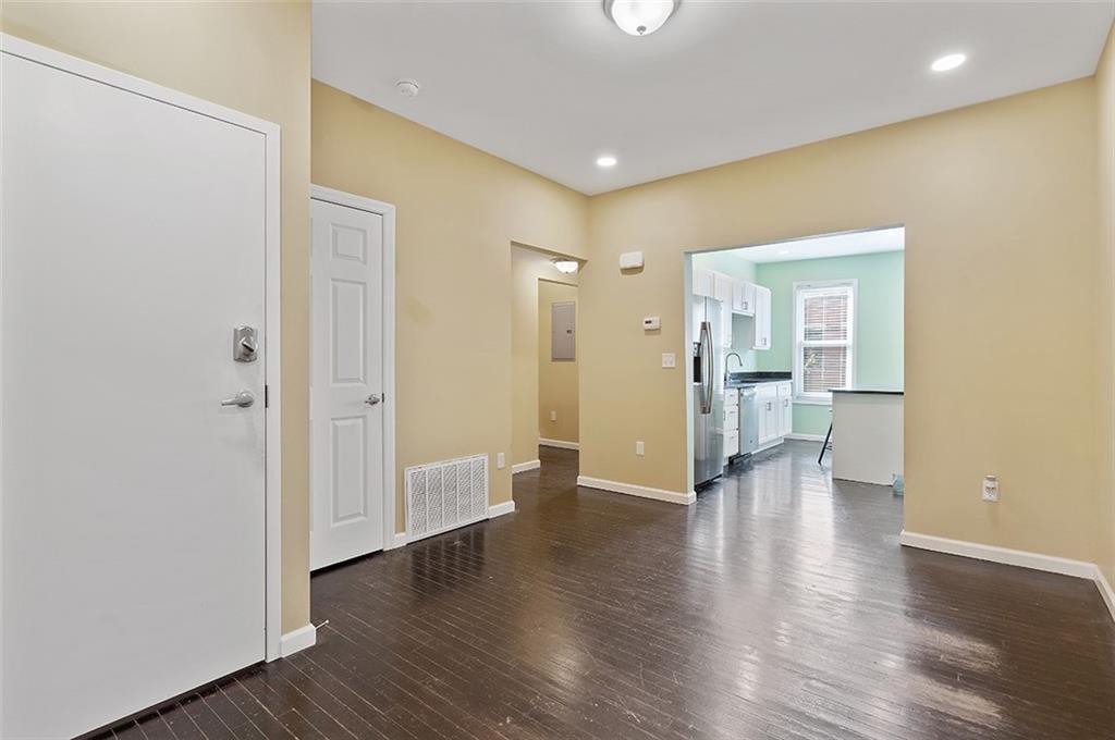 5206 Butler Street Pittsburgh, PA 15201 - Photo 4 of 24 a view of empty room with wooden floor
