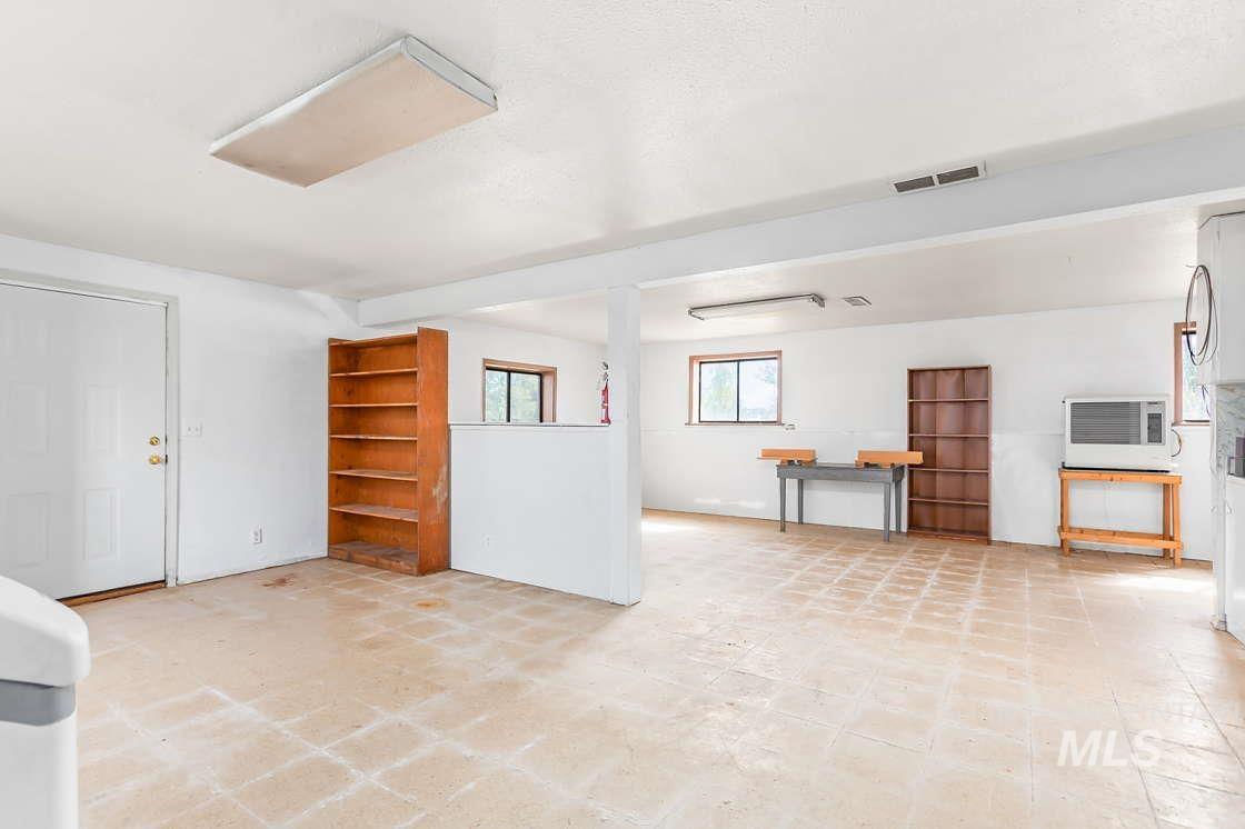255 3 Bear Creek Road Kendrick, ID 83537 - Photo 32 of 44 Unfurnished living room featuring light floors