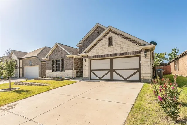 a view of a hallway and a livingroom with wooden floor