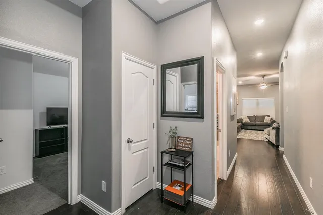a kitchen with sink refrigerator and microwave