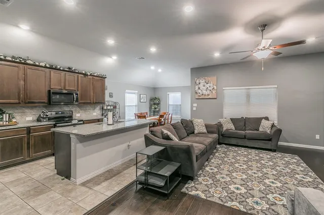 a living room with furniture and a couch