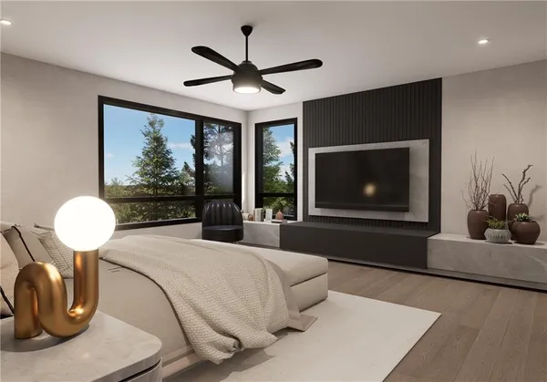 a bedroom with a large bed and a chandelier