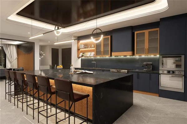 a kitchen with stainless steel appliances granite countertop a stove and a sink