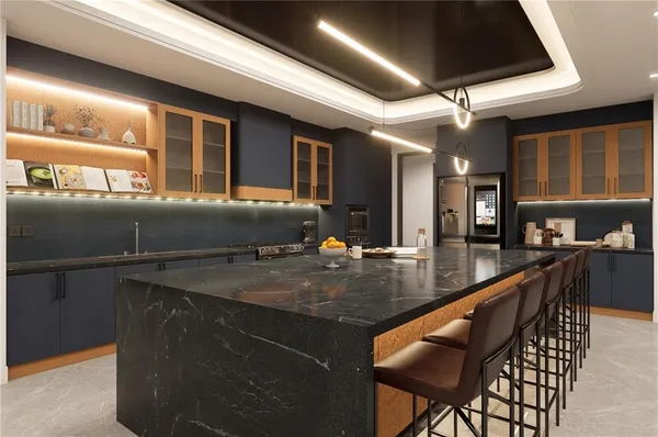 a kitchen with stainless steel appliances granite countertop a sink a stove and a microwave oven