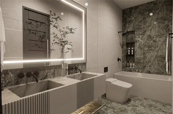 a bathroom with a bathtub sink and toilet